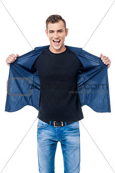 Casual man opening his shirt