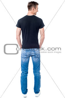Rear view of young casual man