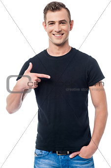 Handsome casual man pointing