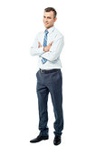 Confident business man with arms crossed