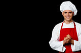 Young male chef posing in uniform