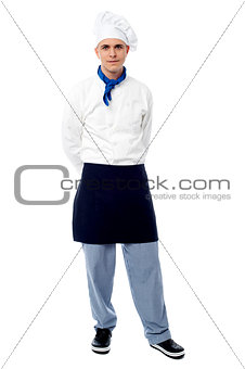 Young male chef posing casually
