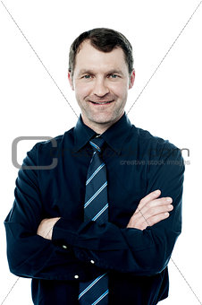 Smiling crossed arms  business executive