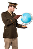 Military officer pointing the globe