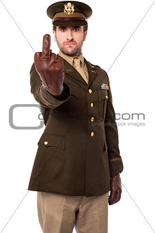 Angry army officer showing middle finger