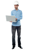 Young engineer with laptop