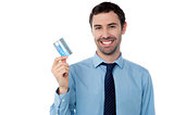 Corporate guy showing his debit card