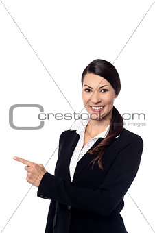 Businesswoman pointing copysoace, isolated on white