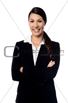 Smiling business woman with folded arms