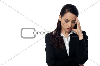 Young businesswoman looking depressed