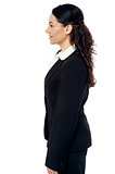 Business woman posing sideways