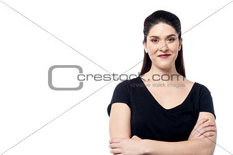 Beautiful woman posing with arms crossed
