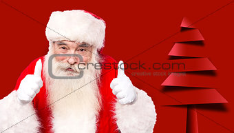 Santa claus giving thumbs up gesture