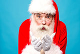Santa claus with open palms