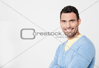 Cheeful man posing with confidence
