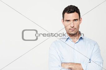 Confident man posing over white