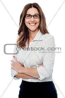 Confident business woman, crossed arms.