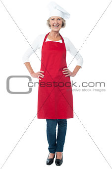 Full length of woman chef over white