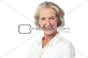 Happy senior woman posing