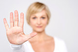 Closeup woman hand showing five