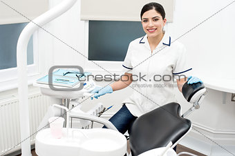 Dental assitant smiling at camera
