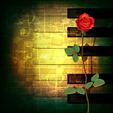 abstract grunge piano background with red rose