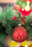 Closeup of red Christmas balls on colored background