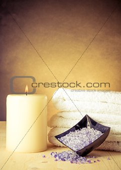 Spa massage border background with towel stacked and sea salt