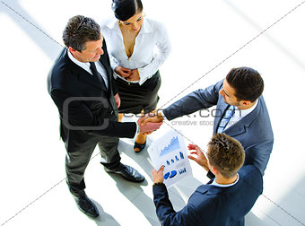 Top view of a two businessman shaking hands