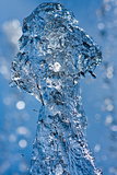 clean water splash on blue background