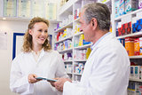 Team of pharmacist holding clipboard