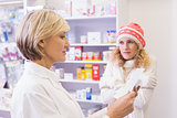 Pharmacist explaining the drug to patient