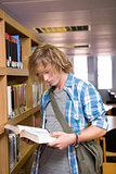Student reading in library
