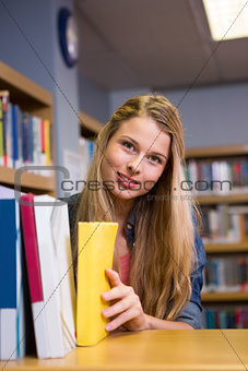 Pretty student in the library