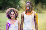 Hipsters covered in powder paint