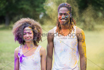 Hipsters covered in powder paint