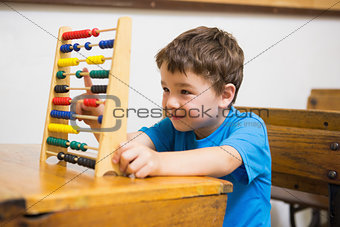 Student doing maths on abacus