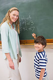 Teacher explaining mathematics to a pupil