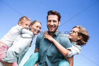 Happy parents with their children