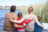 Happy family at a lake