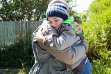 Father and son hugging