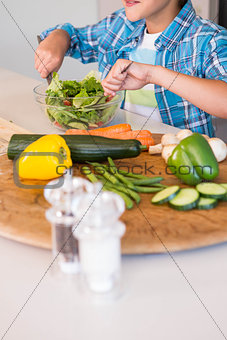 Little boy preparing lunch