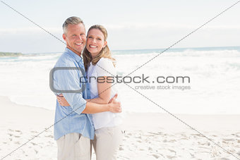 Happy couple smiling at camera