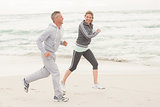 Fit couple jogging together