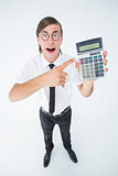 Geeky cheering businessman holding calculator