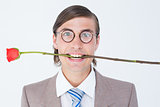 Geeky businessman offering bunch of roses