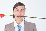 Geeky businessman offering bunch of roses