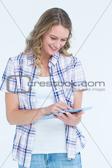 Pretty hipster using tablet