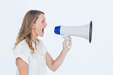 Woman shouting through a loudspeaker