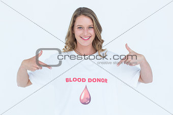 Blood donor showing her t-shirt